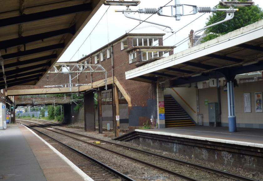 An empty train platform and rails.